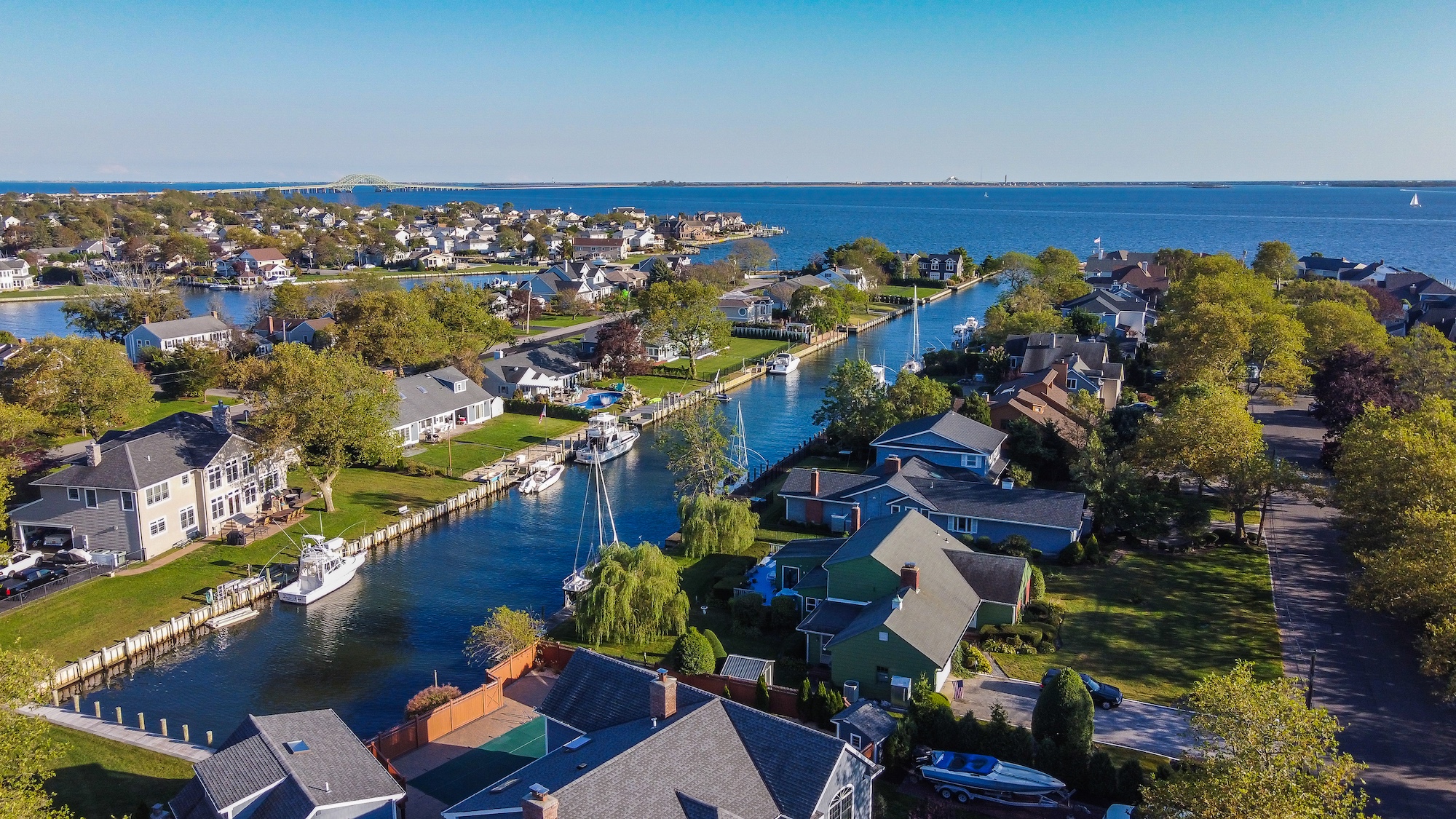 West Islip Waterfront Wonders: A Tale of Two Homes - Jones Hollow ...